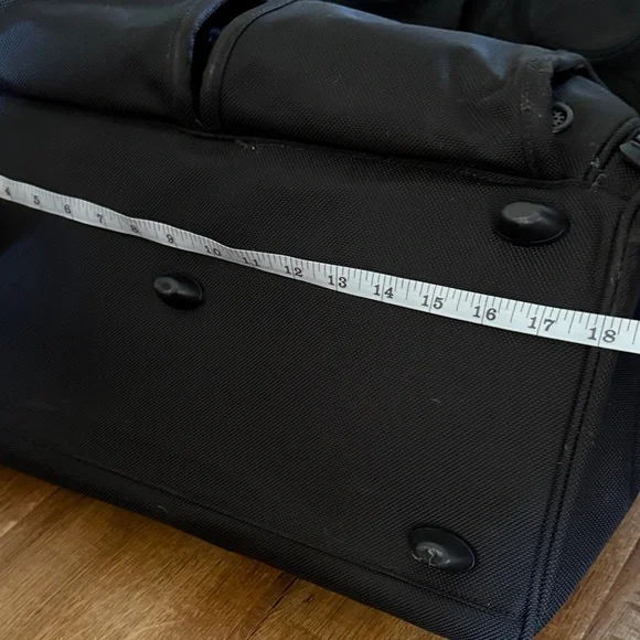 Tumi black travel bag/carryon